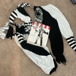 Adult nobody’s full costume includes hood, mask, top pants, waist tie, gloves